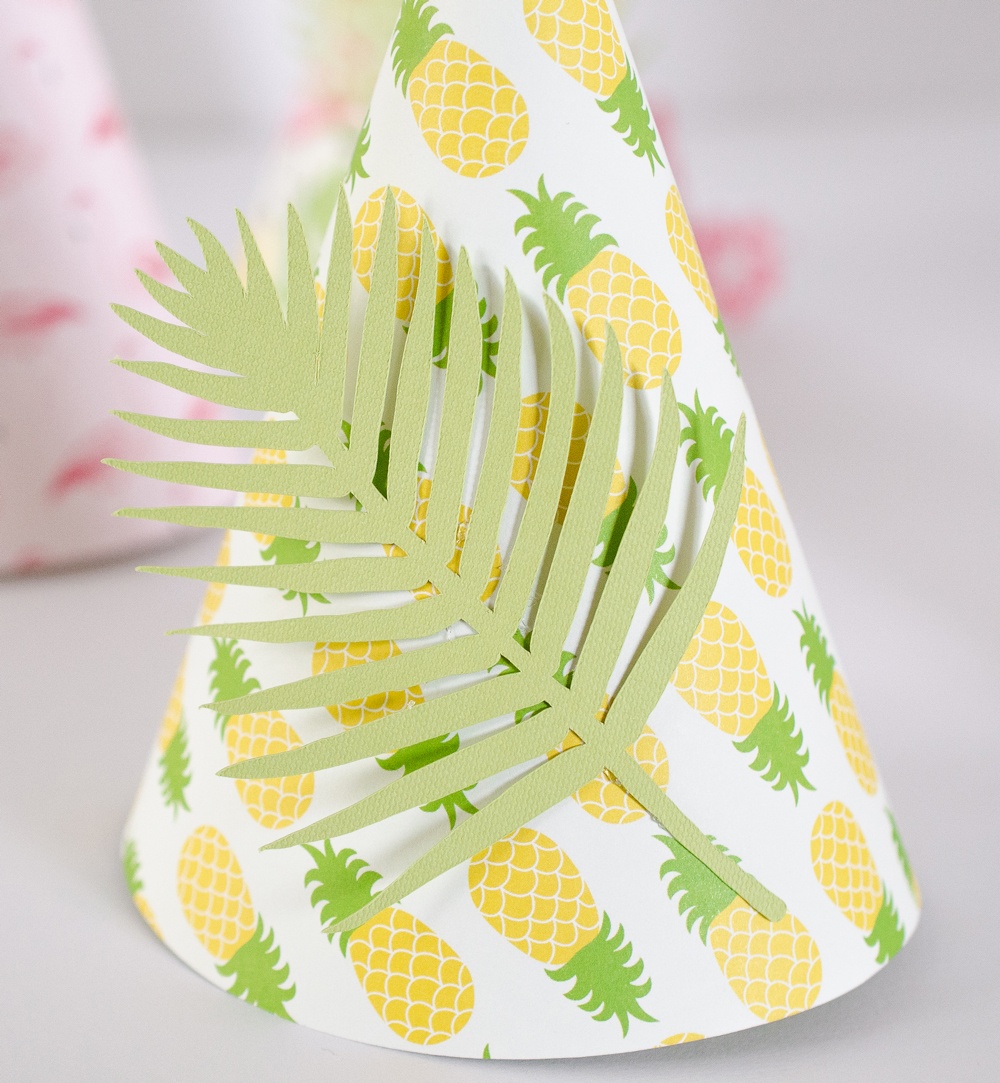 Learn how to make these colorful Tropical Party Hats by Fawn Prints on Love the Day